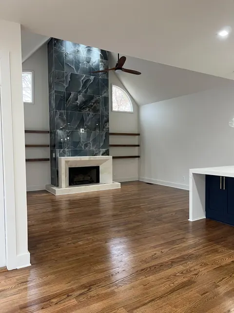 Complete Interior Remodeling: Flooring, Fireplace & Custom Built-Ins by Novahaus Remodels