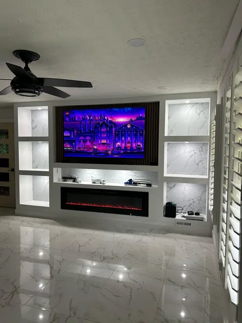 Custom Media Wall, Fireplace & Flooring Remodeling by Novahaus Remodels